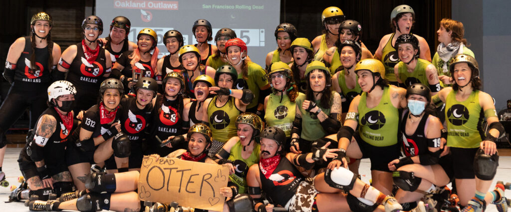 A group photo of skaters from the Oakland Outlaws and San Francisco Rolling Dead.